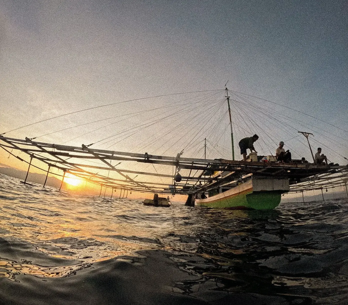 A bagan fishing platform at sunset.