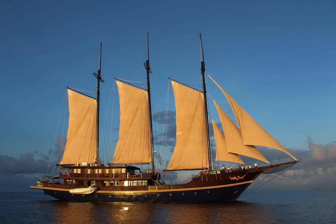The original WAOW under full sail at sunset