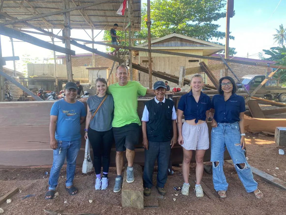 Rahmat, Lorine, Reto, Haji Wahab, Camille and Wulan in front of WAOW 2's keel, September 16, 2025