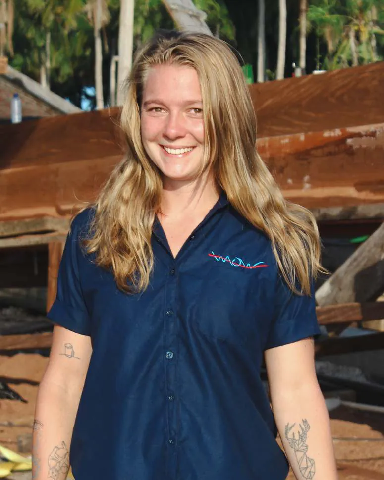 Portrait of Camille Deville in a navy WAOW shirt