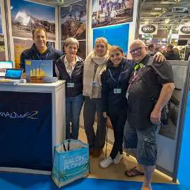 A group of friends at the WAOW 2 booth