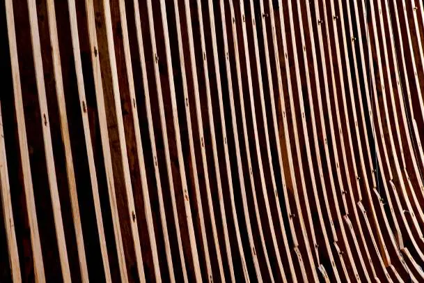 Rows of curved ribs installed along the hull