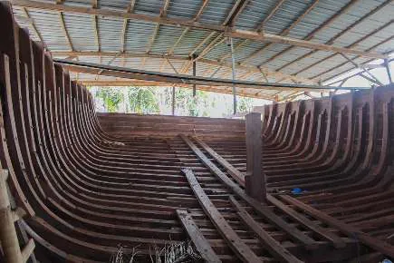 View into the hull of WAOW 2 under the shipyard roof