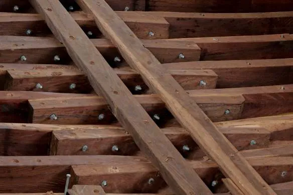Floor timbers bolted across the keel, with the keelson on top