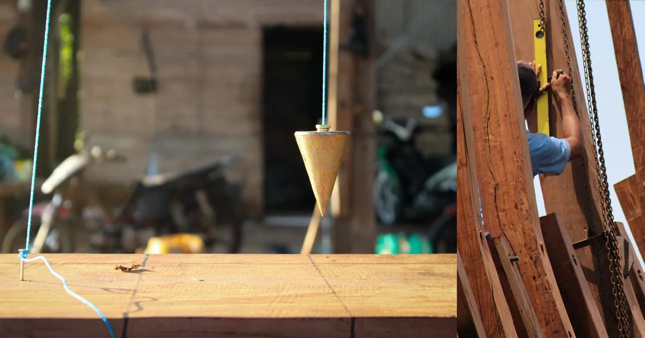 A plumb bob and a chalk line used to check alignment