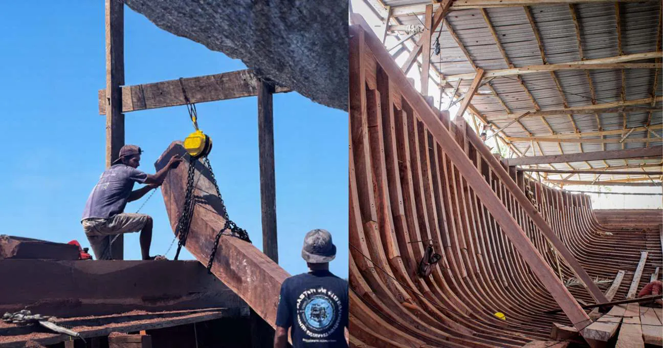 Shipbuilders lifting a heavy timber with a chain block