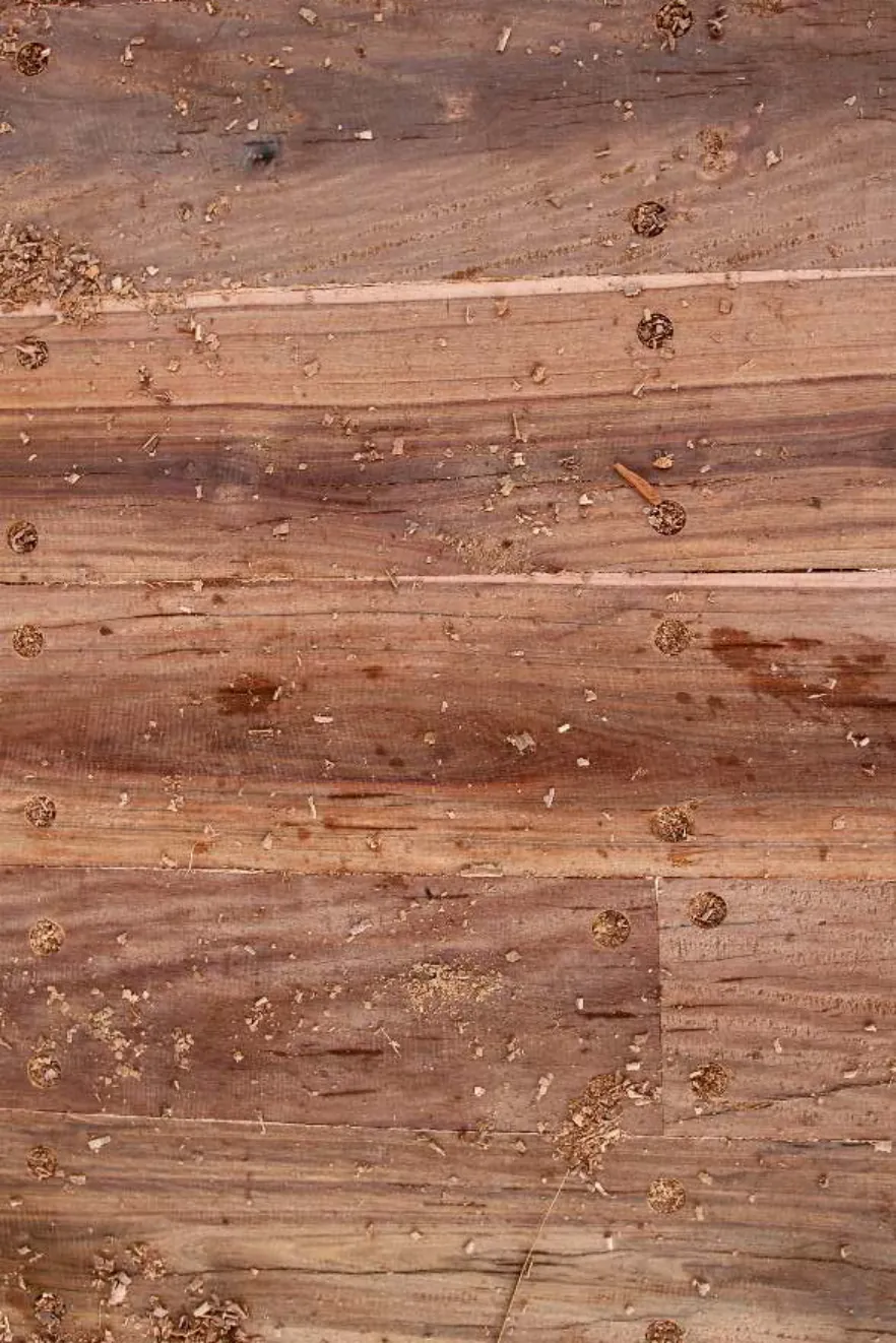 Close-up of the hand-fitted deck planks with wooden pegs