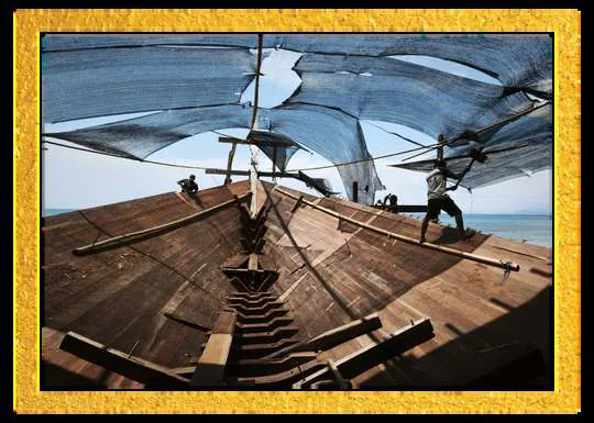 View along the deck of WAOW 2 under shade netting, in a gold frame