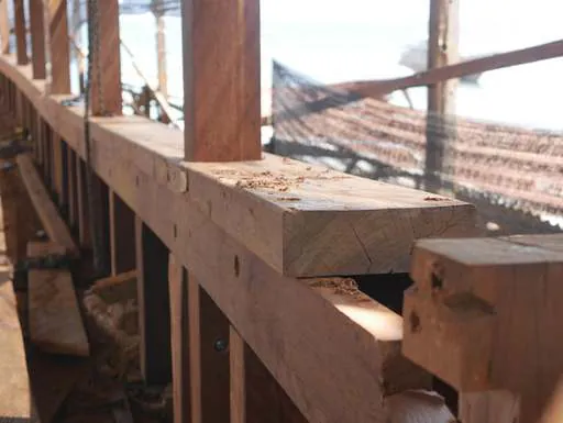 Close-up of a joint in the wooden railing on the main deck