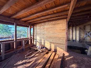 A space on the main deck with new wooden wall panels